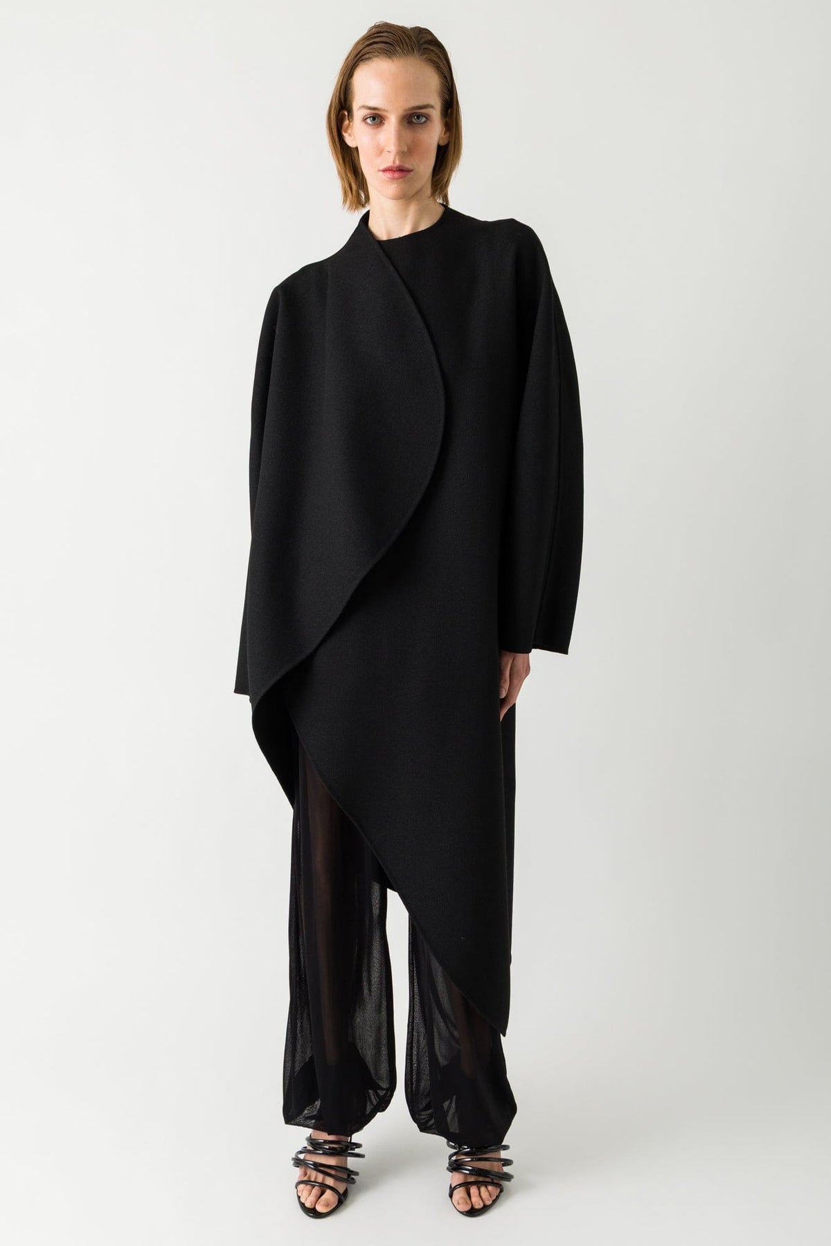 Alaïa Wrap Coat in Black full look