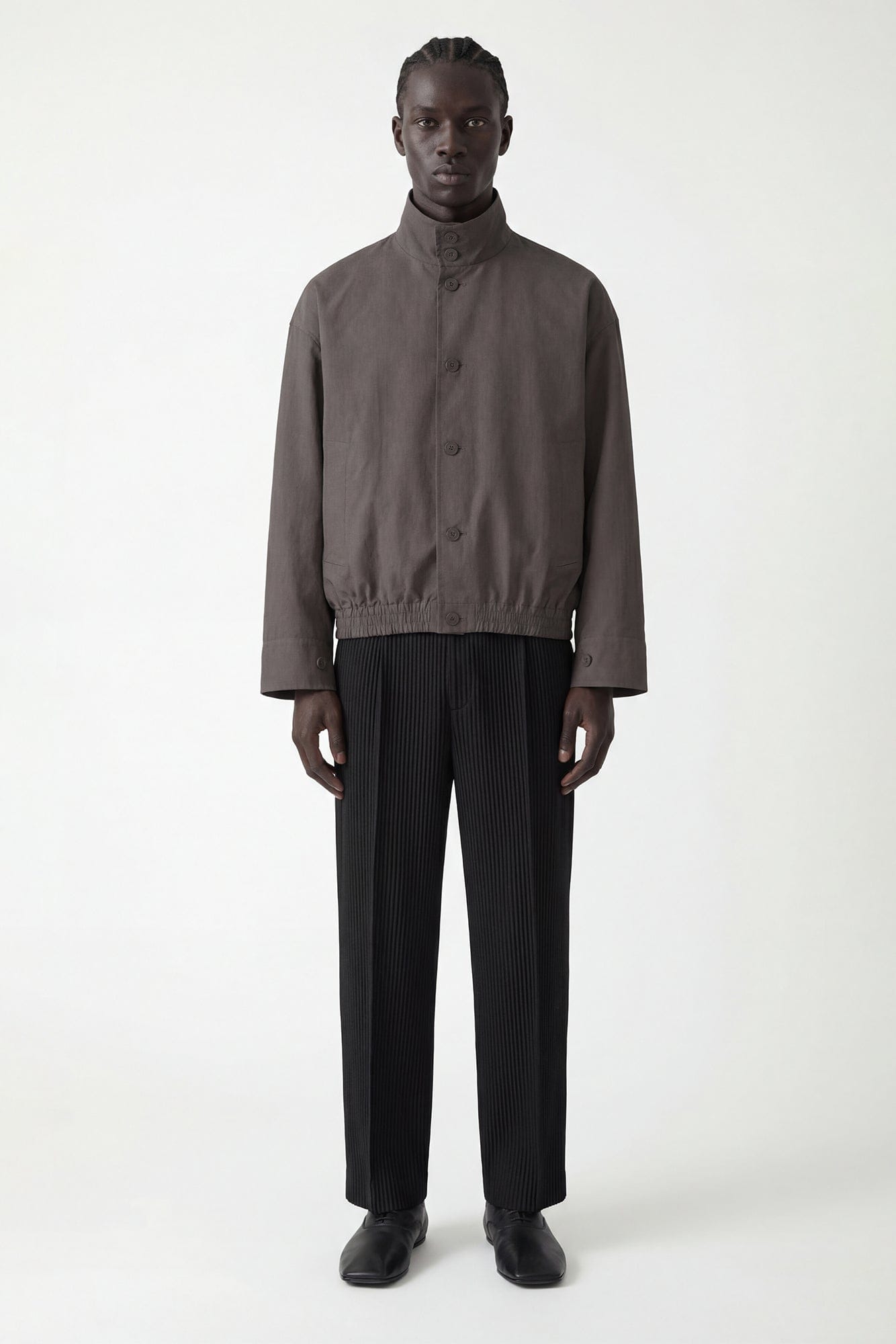 Homme Plissé Issey Miyake Carrier Carried Jacket in Charcoal full look