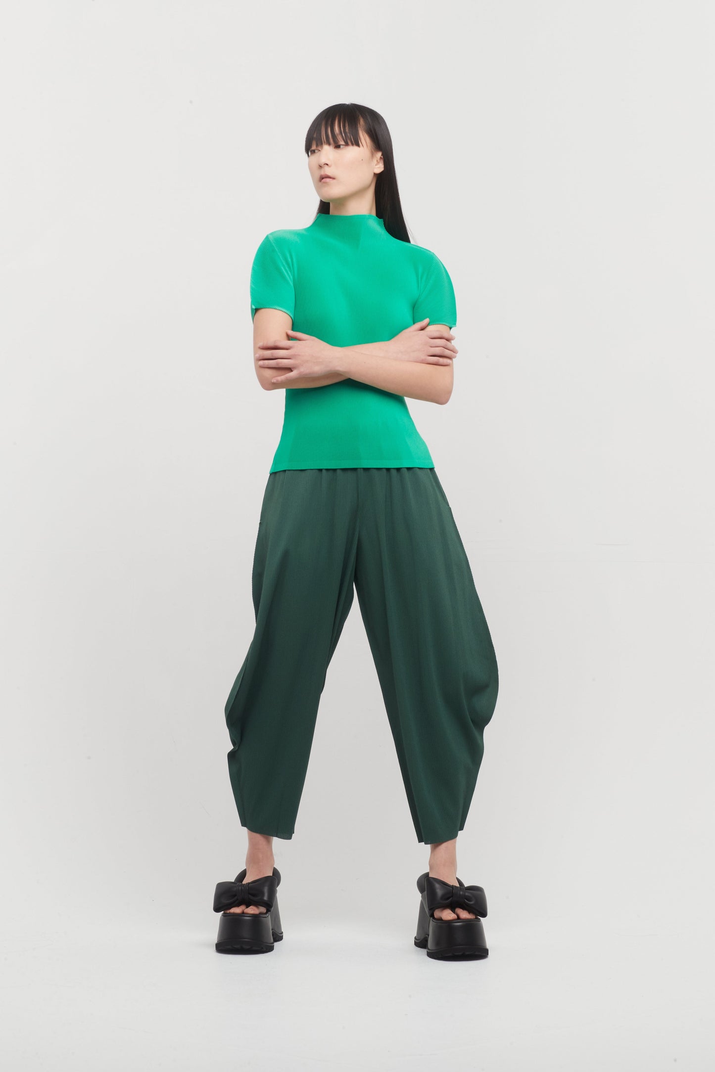 Pleats Please Issey Miyake A-POC Bottoms in Green Chili full look