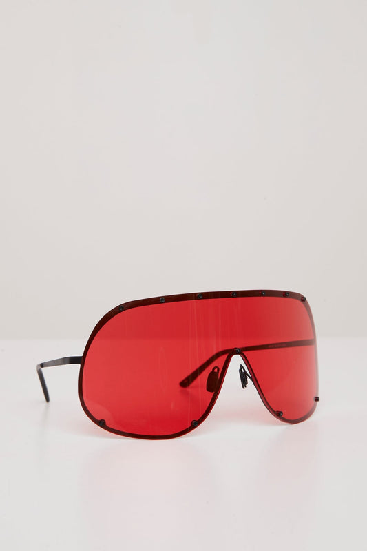 Rick Owens Shield Sunglasses in Cardinal Red angled front