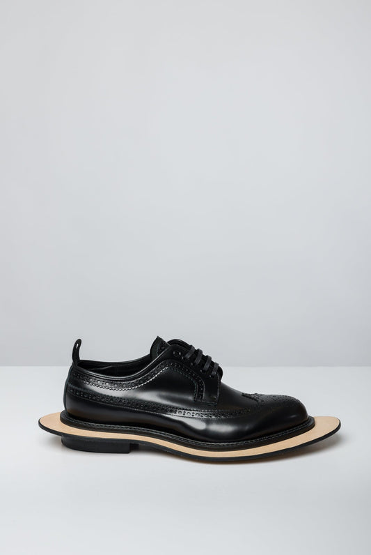 Comme des Garçons Homme Plus x Kids Love Gaite Floating Brogue Derby side
