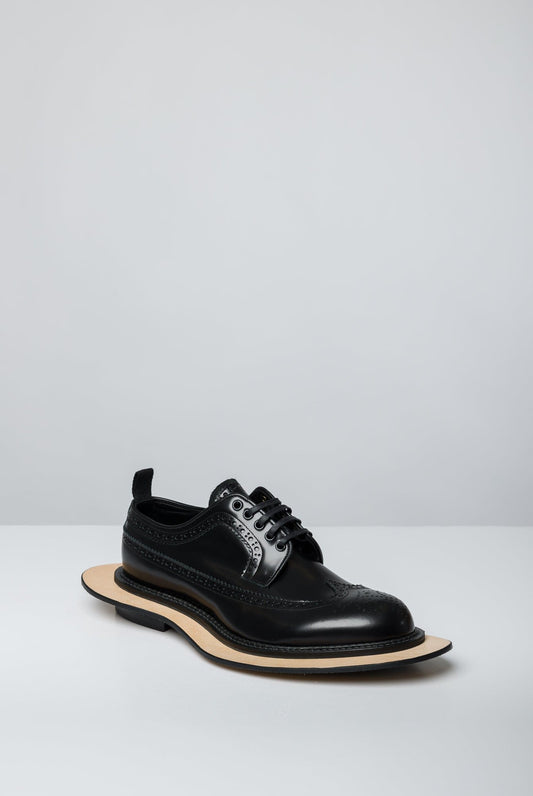 Comme des Garçons Homme Plus x Kids Love Gaite Floating Brogue Derby front angle
