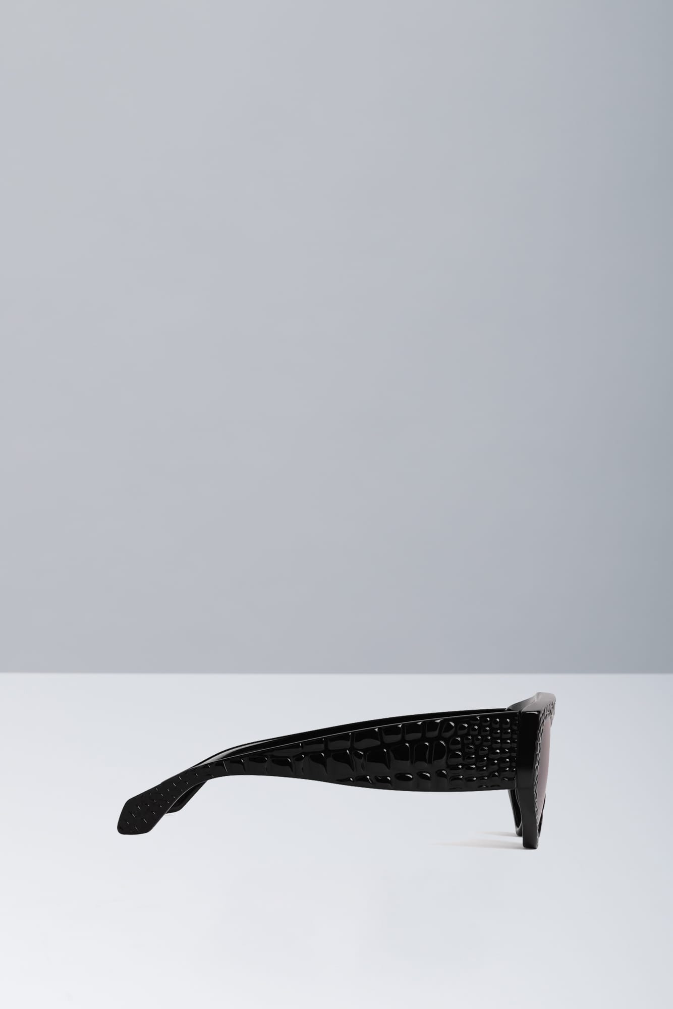 Alaïa D-Frame Textured Acetate Sunglasses in Black side