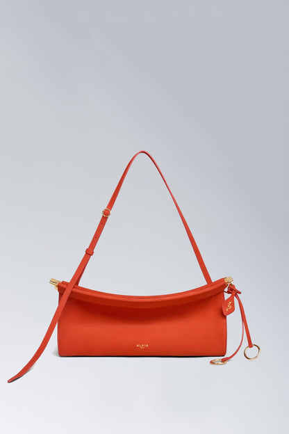 Alaïa East West in Orange Brule