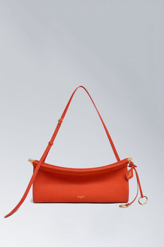 Alaïa East West in Orange Brule