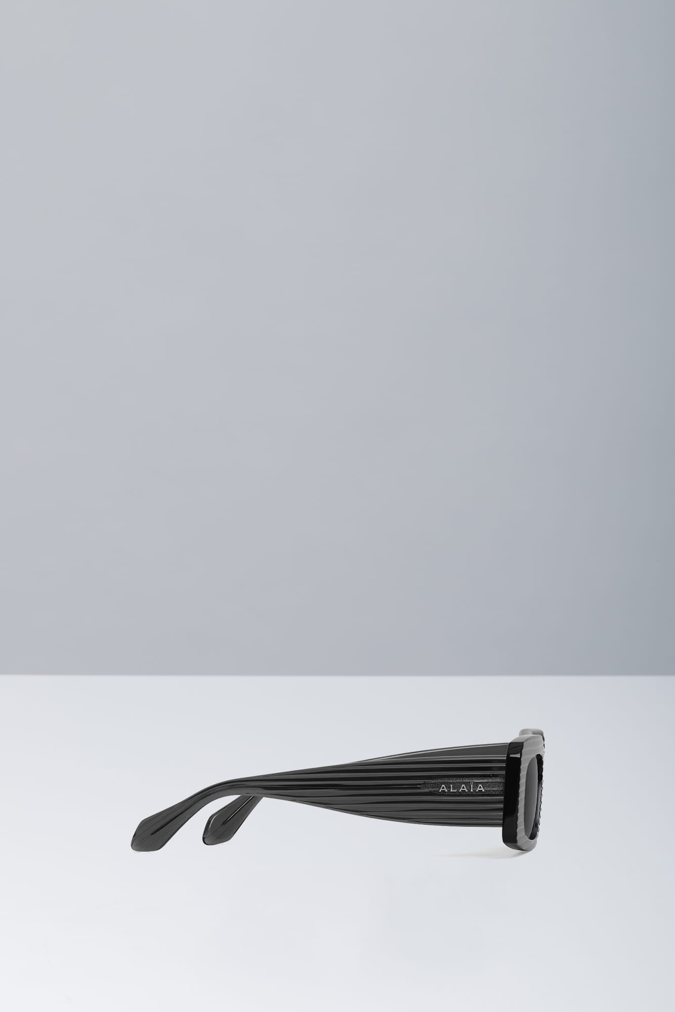 Alaïa Two Tone Black Sunglasses in Acetate