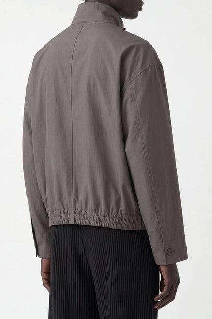 Homme Plissé Issey Miyake Carrier Carried Jacket in Charcoal back