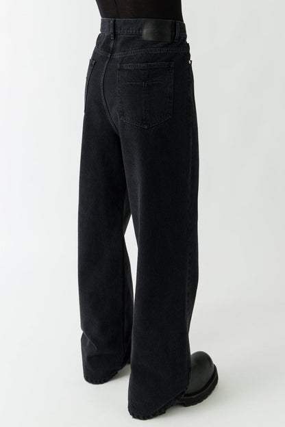 Matières Fécales Black Woven Jeans on man back