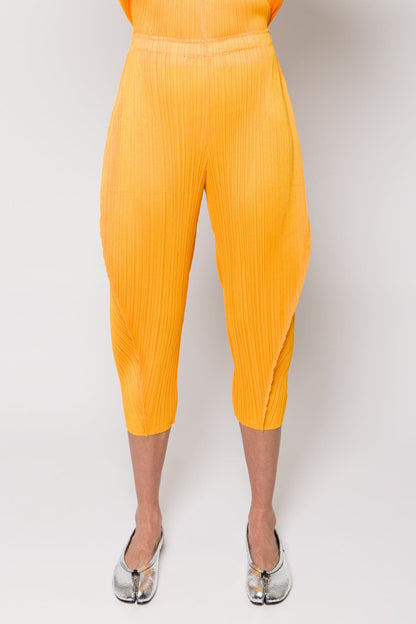 Pleats Please Issey Miyake Lantern Trousers in Orange Yellow SS25