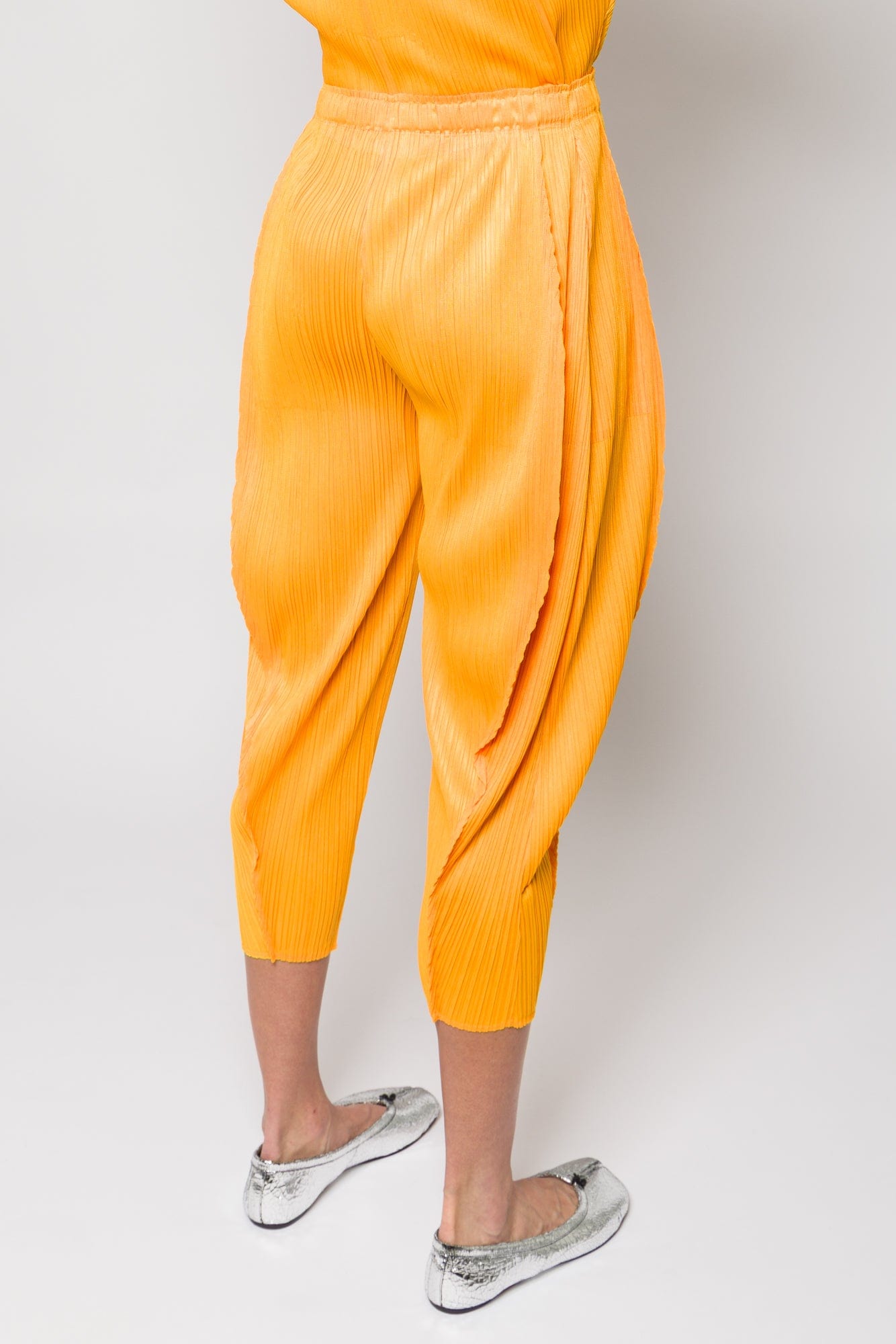 Pleats Please Issey Miyake Lantern Trousers in Orange Yellow SS25