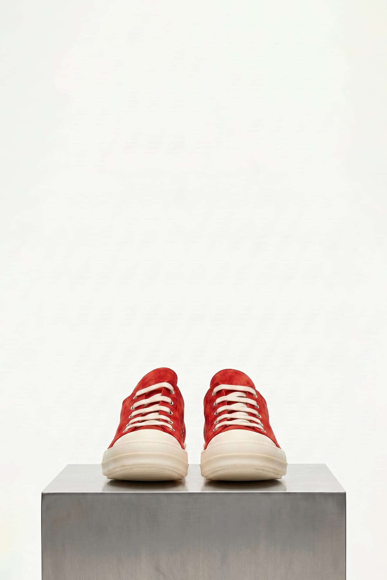 Rick Owens Extreme Low Sneaks in Carnelian front