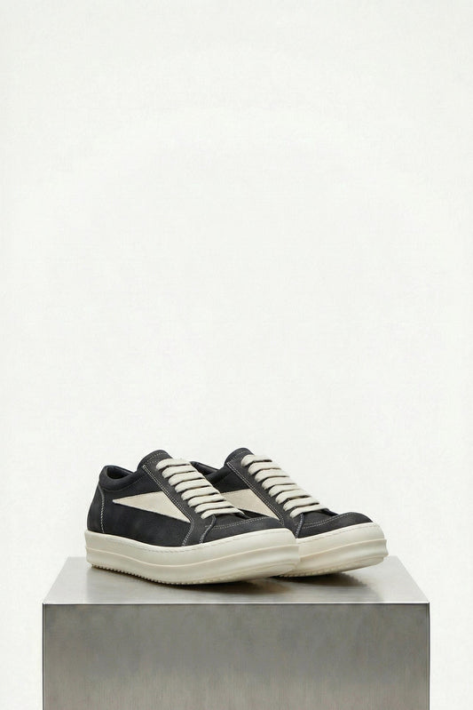 Rick Owens Scarpe In Pelle Extreme Low Sneaks in Black/Milk SS26 side